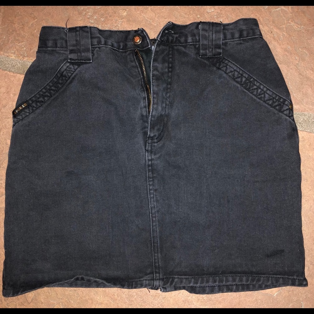 Women’s black denim mini skirt.